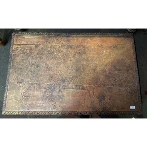 838A - Antique wooden low table with detailed side panels. Approx H39cm x W113cm x D72cm