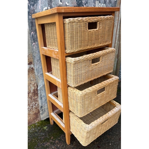 898 - Modern pine unit with four wicker drawers. Approx H100 x 50 x 33cm