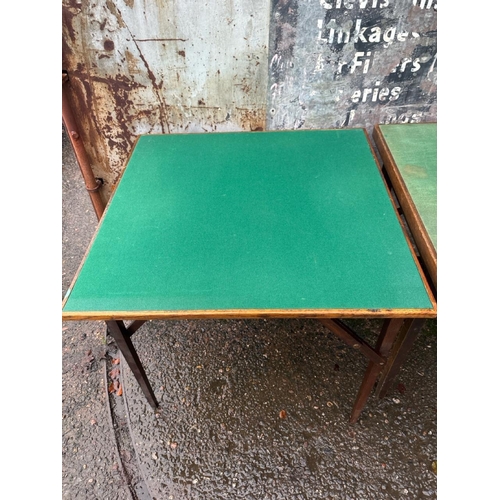 943 - Two vintage baize-topped folding card/games tables. Both approx H70cm x W71cm x D71cm.