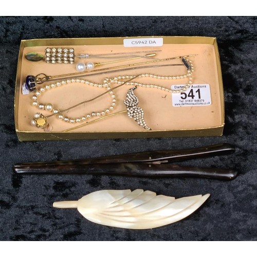 541 - Box of antique hat pins including an abalone shell and a blue glass claw set stone, a faux pearl nec... 