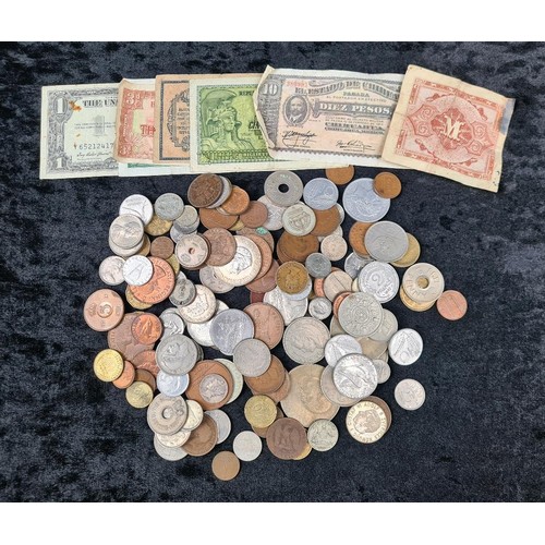 580 - Vintage tin containing British and foreign collectible coins and banknotes