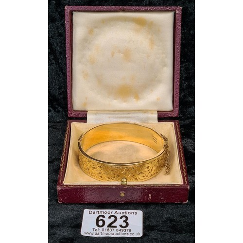 623 - 9ct gold plated decorative hinged bangle with security chain