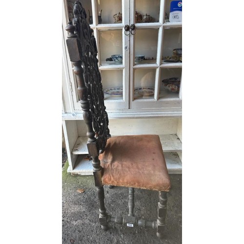 968 - Antique Jacobean Revival carved oak hall chair with a velvet seat cushion.