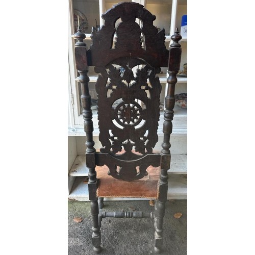 968 - Antique Jacobean Revival carved oak hall chair with a velvet seat cushion.