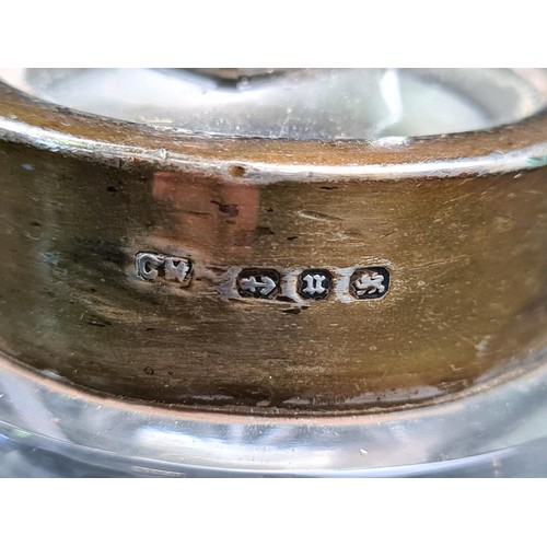 586 - Silver lidded glass dressing table pin dish (Birmingham 1903), silver collared perfume bottle (rubbe... 