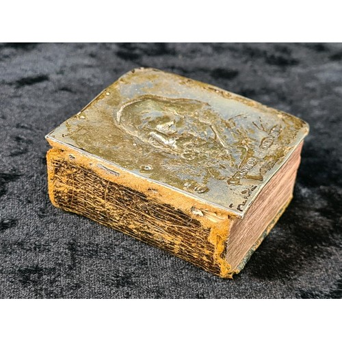 605 - Tennyson’s Poetical Works miniature book with silver front cover bearing portrait of Tennyson. Indis... 