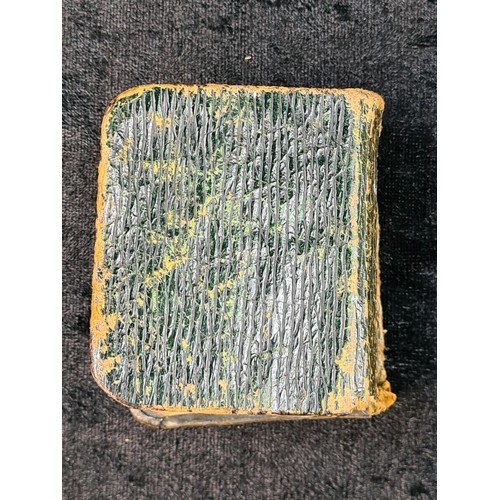 605 - Tennyson’s Poetical Works miniature book with silver front cover bearing portrait of Tennyson. Indis... 