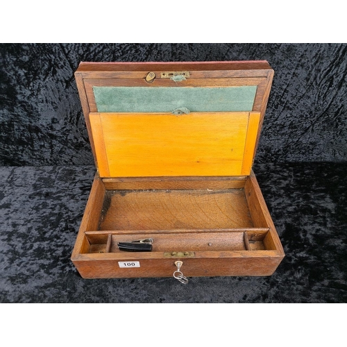 100 - Antique wooden writing slope with pen and inkwells and key. Approx H14 x W40 x D24cm.