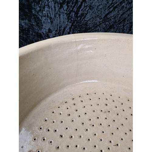 101 - Very large and very heavy antique stoneware drainer bowl, originally used to sieve clotted cream! Wo... 