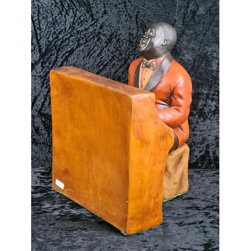 106 - Vintage fibreglass jazz pianist figurine. Approx H38cm.
