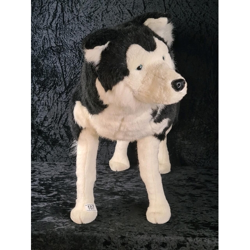 107 - Almost life-size standing husky dog stuffed toy, made by DPL Leeds Ltd. Approx H55cm.