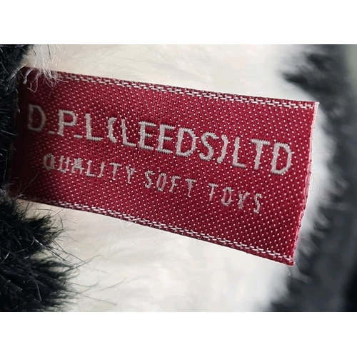 107 - Almost life-size standing husky dog stuffed toy, made by DPL Leeds Ltd. Approx H55cm.