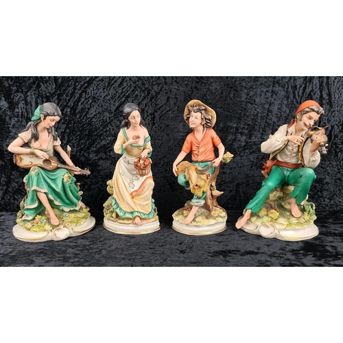 57 - Italian Capodimonte ‘Four Seasons’ hand-painted figurines. Each approx H24cm