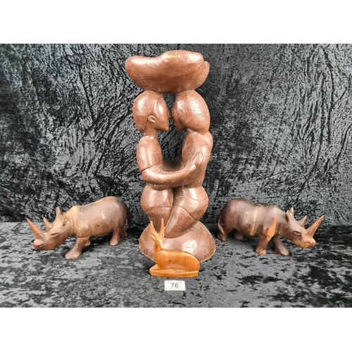 76 - Asian hand-carved wooden abstract sculpture of an embracing couple (approx H44cm) plus two wooden hi... 