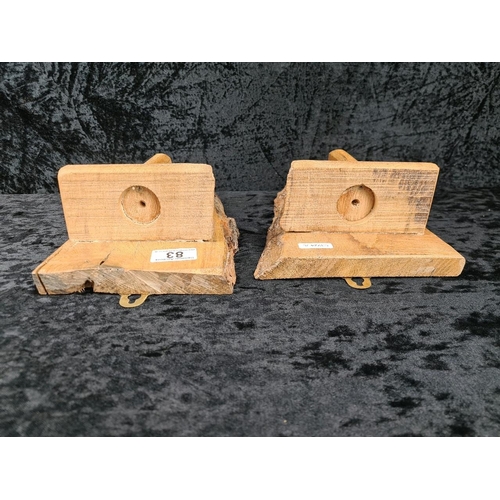 83 - Pair of rustic hand-carved wooden candle sconces. Approx H28cm.