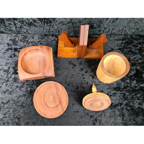 87 - Three hand-carved wooden pieces including a vintage pair of Scottie dog bookends and two lidded trin... 