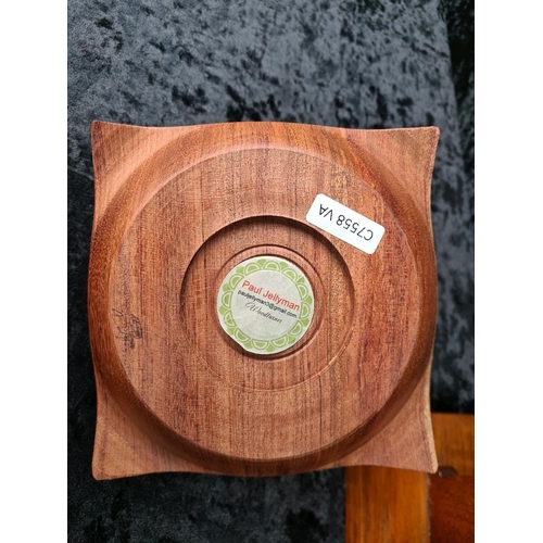 87 - Three hand-carved wooden pieces including a vintage pair of Scottie dog bookends and two lidded trin... 