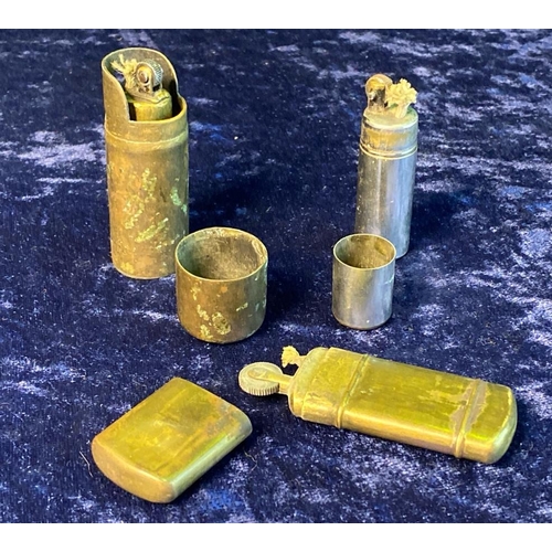 Three vintage metal lighters and a rope lighter, possibly military / trench