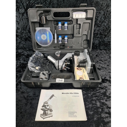 Cased MicroSet 40x-1024x microscope with accessories.