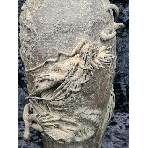 333 - Heavily patinated oriental bronze dragon vase, approx H26cm