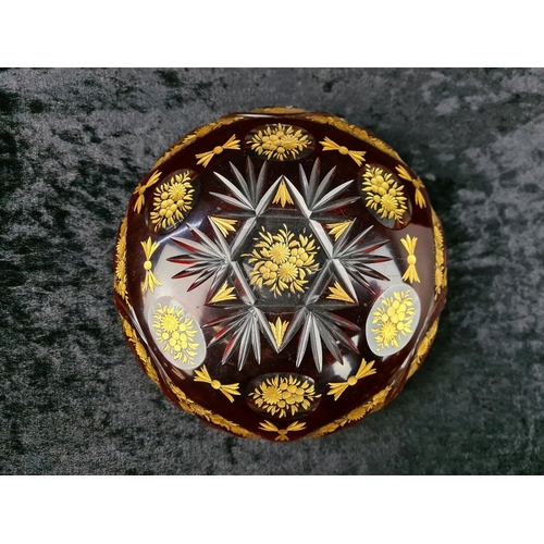 336 - Bohemian red and clear crystal bowl with gilded pattern, approx Dia18cm.