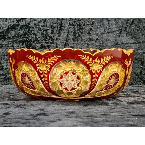 336 - Bohemian red and clear crystal bowl with gilded pattern, approx Dia18cm.