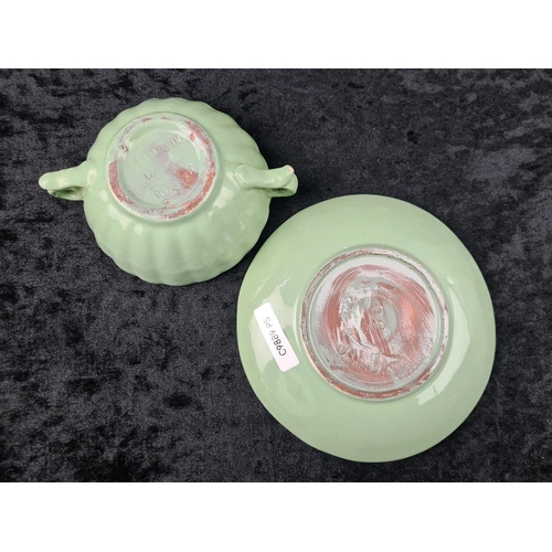 142 - Pretty green vintage lidded pottery dishes by CH Brannam of Barnstaple, plus a Clovelly jug and a pi... 