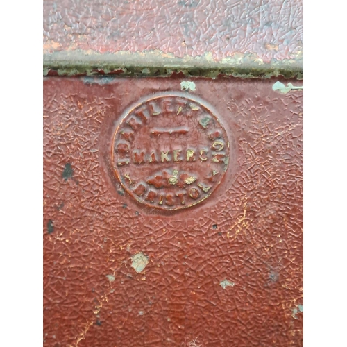 156 - Wonderful old large painted metal tea container from Bristol. Approx H44cm.