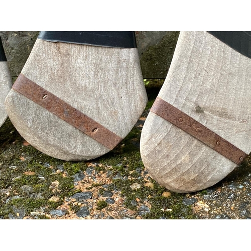 252 - Three vintage Shinty sticks of different sizes.