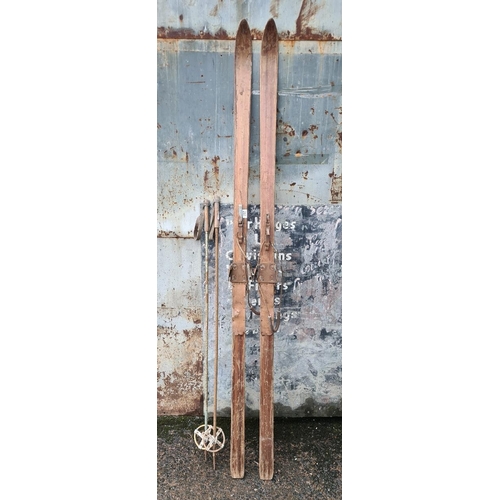 257 - Set of wooden vintage skis and poles, relive the Winter Olympics or great as a display piece,