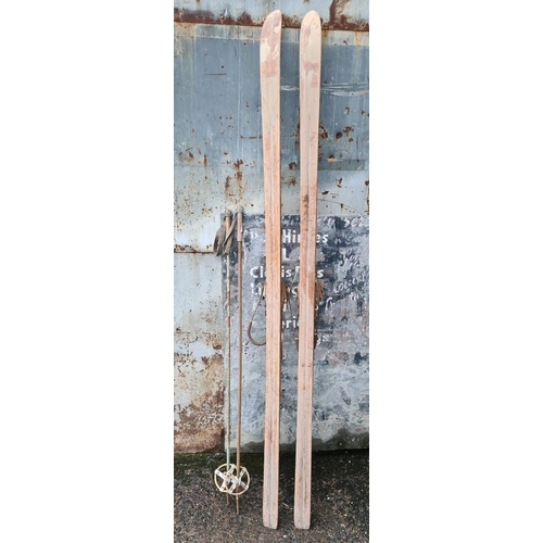 257 - Set of wooden vintage skis and poles, relive the Winter Olympics or great as a display piece,