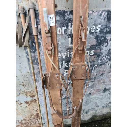 257 - Set of wooden vintage skis and poles, relive the Winter Olympics or great as a display piece,