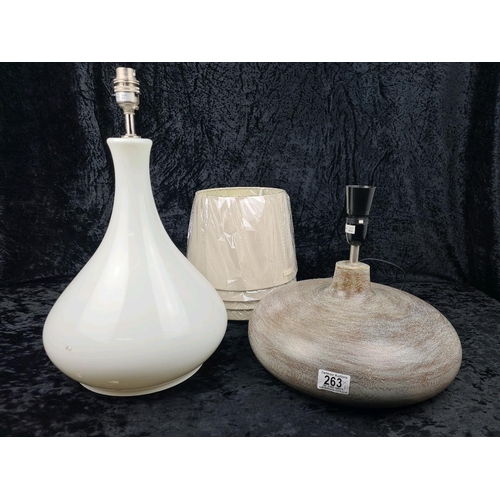 263 - Two stylish lamps (one with shade) plus four new ivory lampshades in packaging.