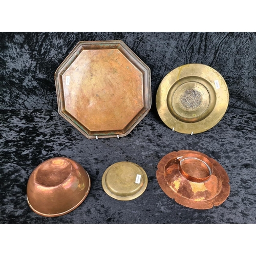 271 - Heavy copper bowl and hammered copper footed bowl, two Chinese brass decorated plates and a hexagona... 