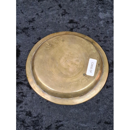 271 - Heavy copper bowl and hammered copper footed bowl, two Chinese brass decorated plates and a hexagona... 