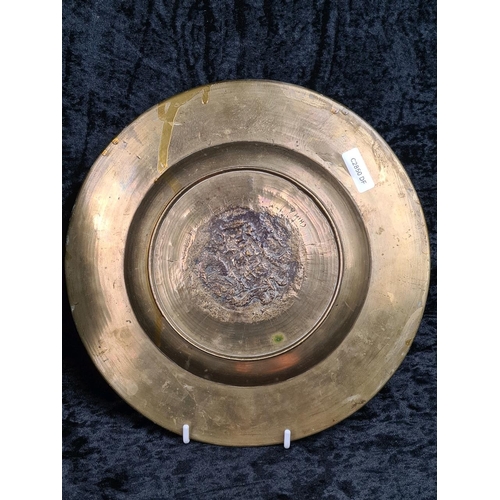 271 - Heavy copper bowl and hammered copper footed bowl, two Chinese brass decorated plates and a hexagona... 