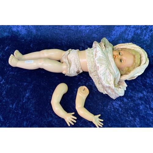 305 - Vintage talking doll marked ‘Made in England’ (needs arms restringing), a Wembley souvenir embroider... 