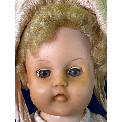 305 - Vintage talking doll marked ‘Made in England’ (needs arms restringing), a Wembley souvenir embroider... 
