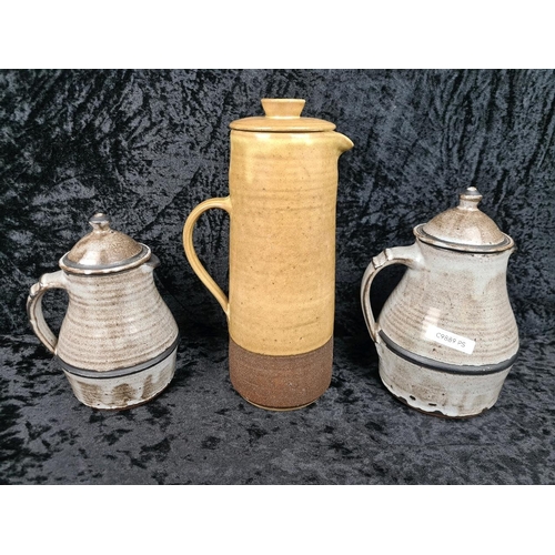 322 - Two studio Pottery tea pots, (makers’ mark to base of handle), Vellow pottery coffee pot, pale blue ... 