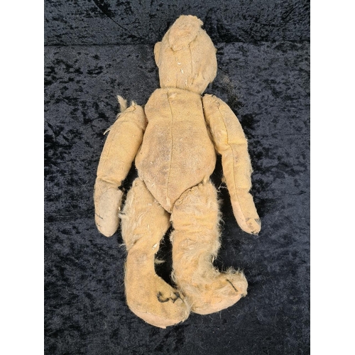 324 - Farnell’s Alpha toys antique jointed teddy bear, original badge still on foot, very loved, missing s... 
