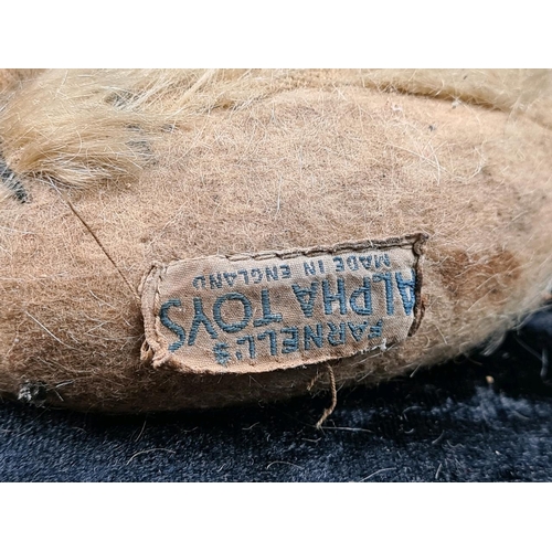324 - Farnell’s Alpha toys antique jointed teddy bear, original badge still on foot, very loved, missing s... 