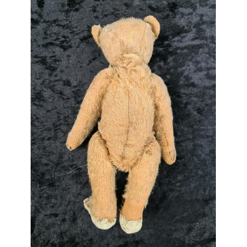 327 - Antique small straw filled teddy bear with the remains of a growler inside (not working), glass bead... 