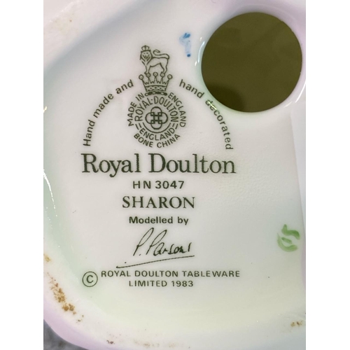 360 - Four Royal Doulton figurines tallest approx 21.5cm and a Carlton ware basque mug approx H10cm.