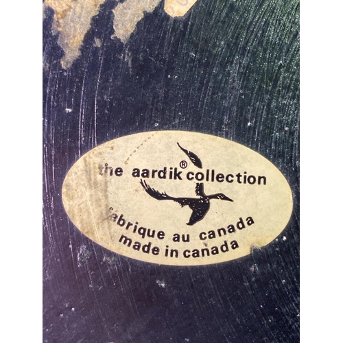 381 - Two Canadian sculptures, large bear sculpture, marked ‘The Aardik collection’ approx H14cm and a res... 