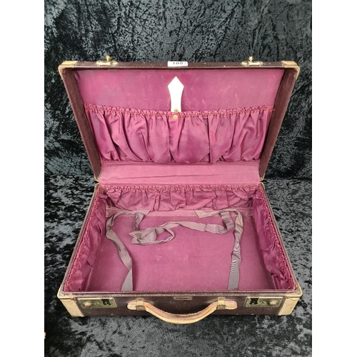 108 - Pair of chic vintage suitcases, likely dating from the 1940s or 1950s. Largest approx W46 x D32cm.