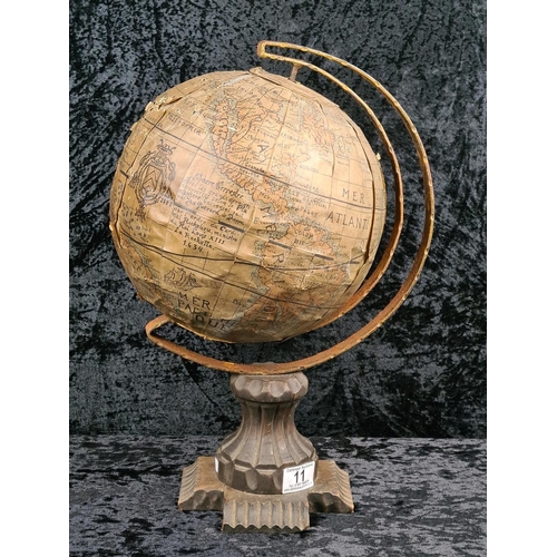 11 - Vintage French terrestrial globe themed around 17th-century cartography, with a metal frame and pede... 