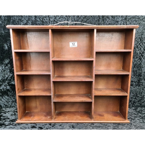 12 - Handy wall-hanging wooden display/shelf unit. Measures approx H46cm x W56cm.