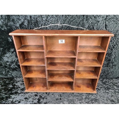 12 - Handy wall-hanging wooden display/shelf unit. Measures approx H46cm x W56cm.