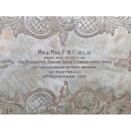 19 - 1930s decorative silver-plate tray with a pierced border and scrollwork handles. Enscribed with the ... 