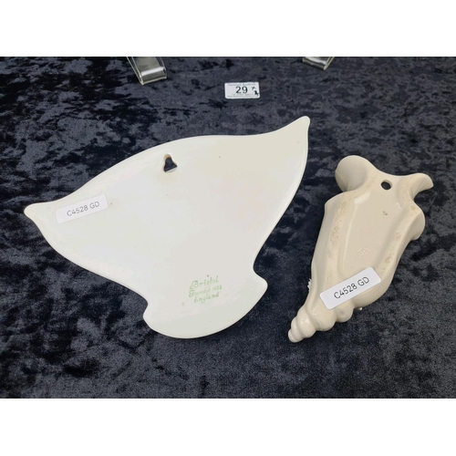 29 - Four fabulous vintage kitsch-as-they-come ceramic wall pockets. Largest approx H21cm.